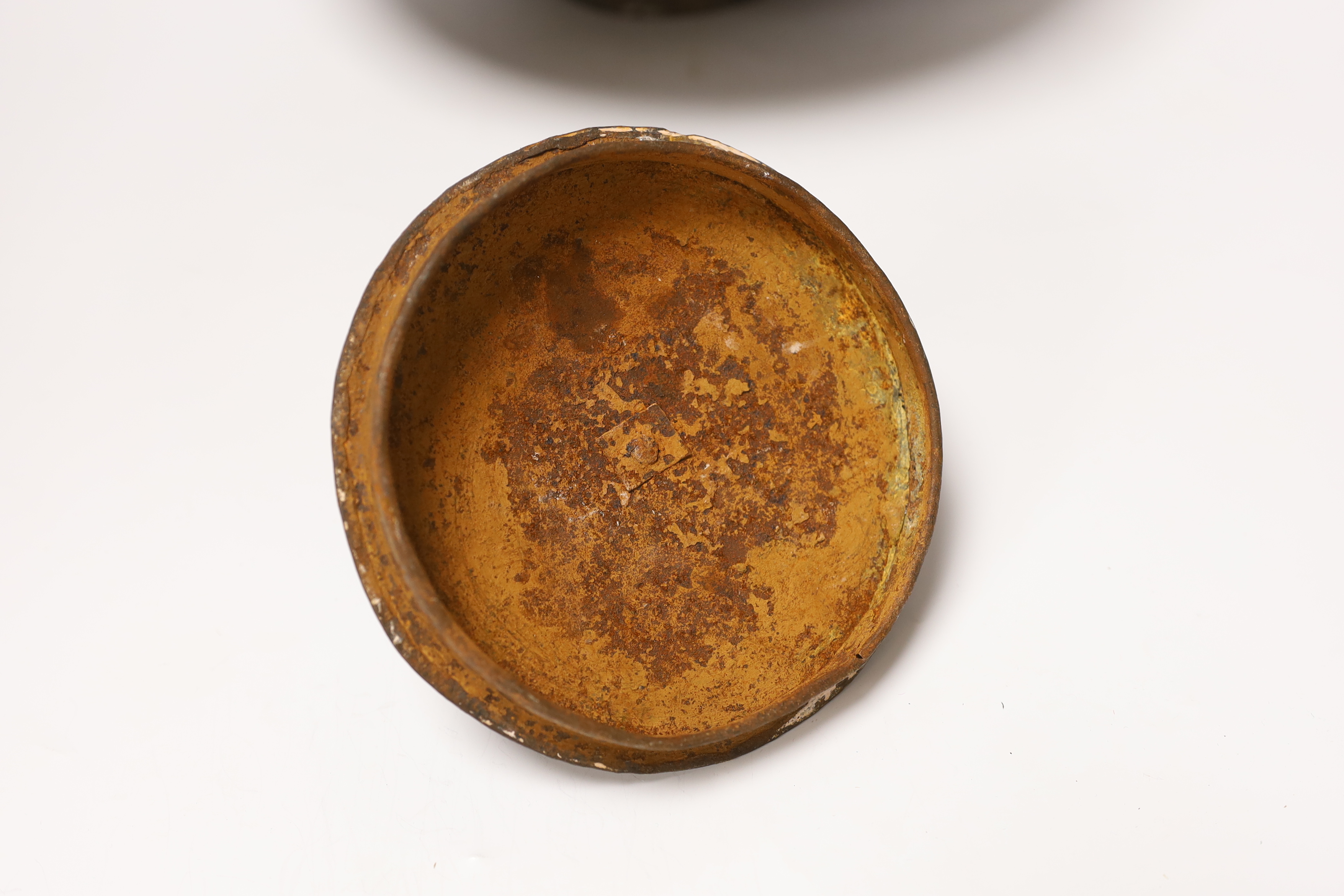 A metal etched eastern squat vase and cover, 32cm high